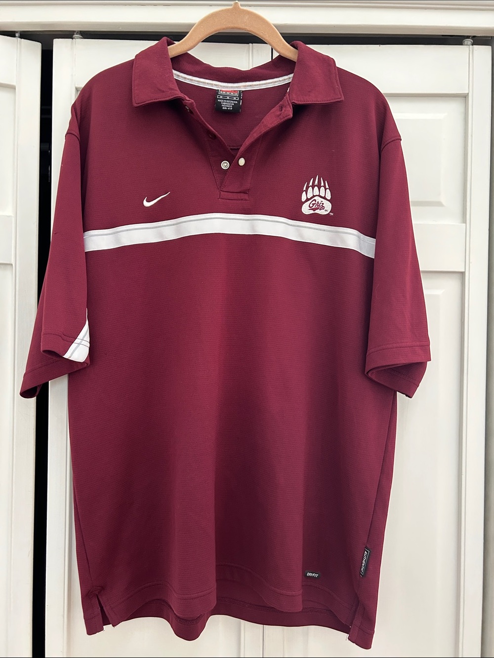 University of Montana Nike Men's Maroon Polo with White  Stripe and embroidered